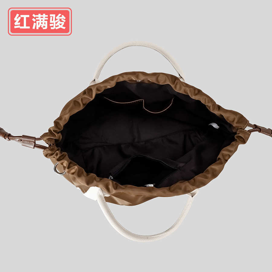 Spring multifunctional drawstring bucket bag, fashionable contrasting color drawstring fitness bag, women's nylon cloth single shoulder crossbody