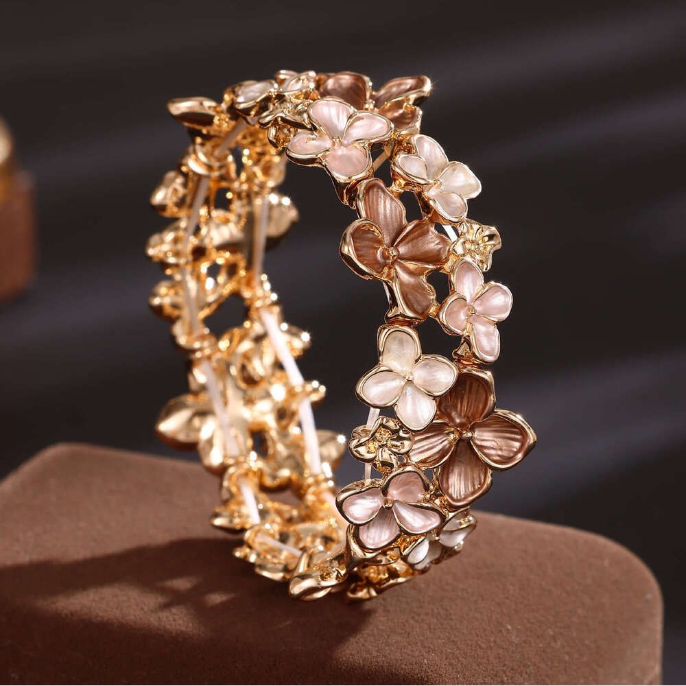 Designer bracelet Hot selg enamel colored elastic for women, high-end and versatile cherry blossom alloy bracelet