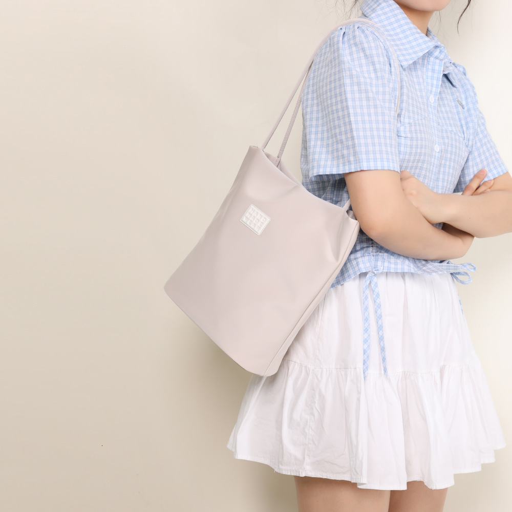 Premium sense bucket female niche soft leather fashion commuter large capacity shoulder bag
