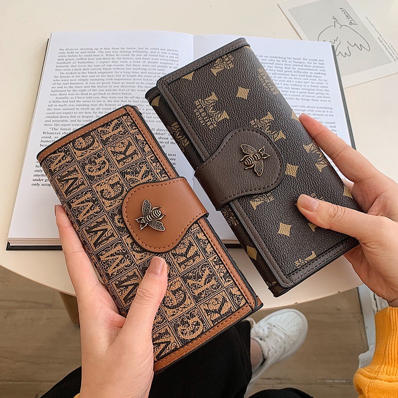 New 2025 Women's Buckle Printed Bee Fashion Simple Three fold Large Capacity Handheld Wallet Designer with Multiple Card Spaces Trendy Zero Walle