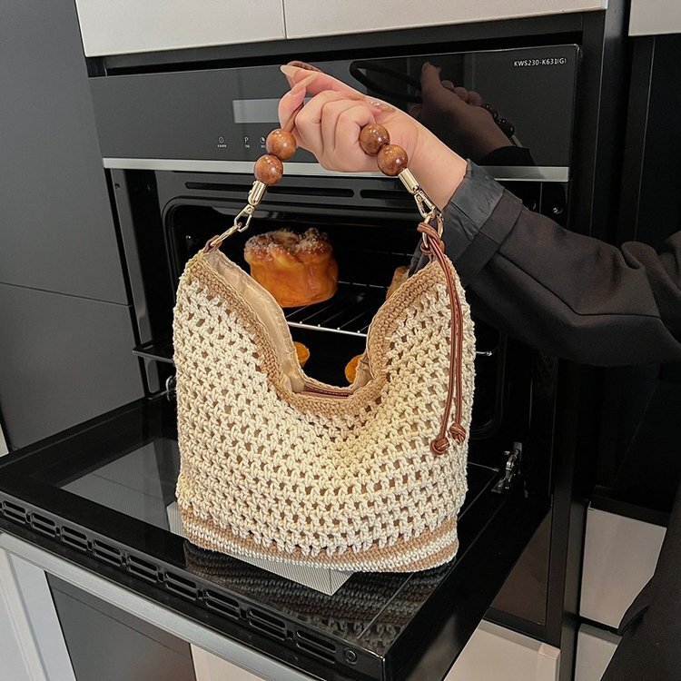 Spring and summer hollow women's 2025 new commuting single shoulder diagonal cross beach vacation grass woven tote bag #swissmilitary