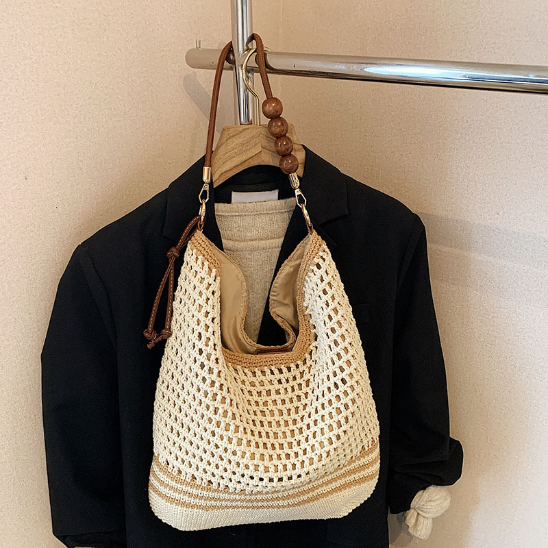 Beach vacation straw for women's 2025 summer new commuting shoulder crossbody bag, hollowed out woven tote bag #swissmilitary