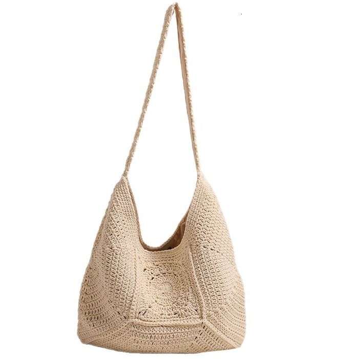 2025 High end single shoulder large capacity cotton thread with hollowed out flower grass woven vacation style beach bag, versatile women's bag #