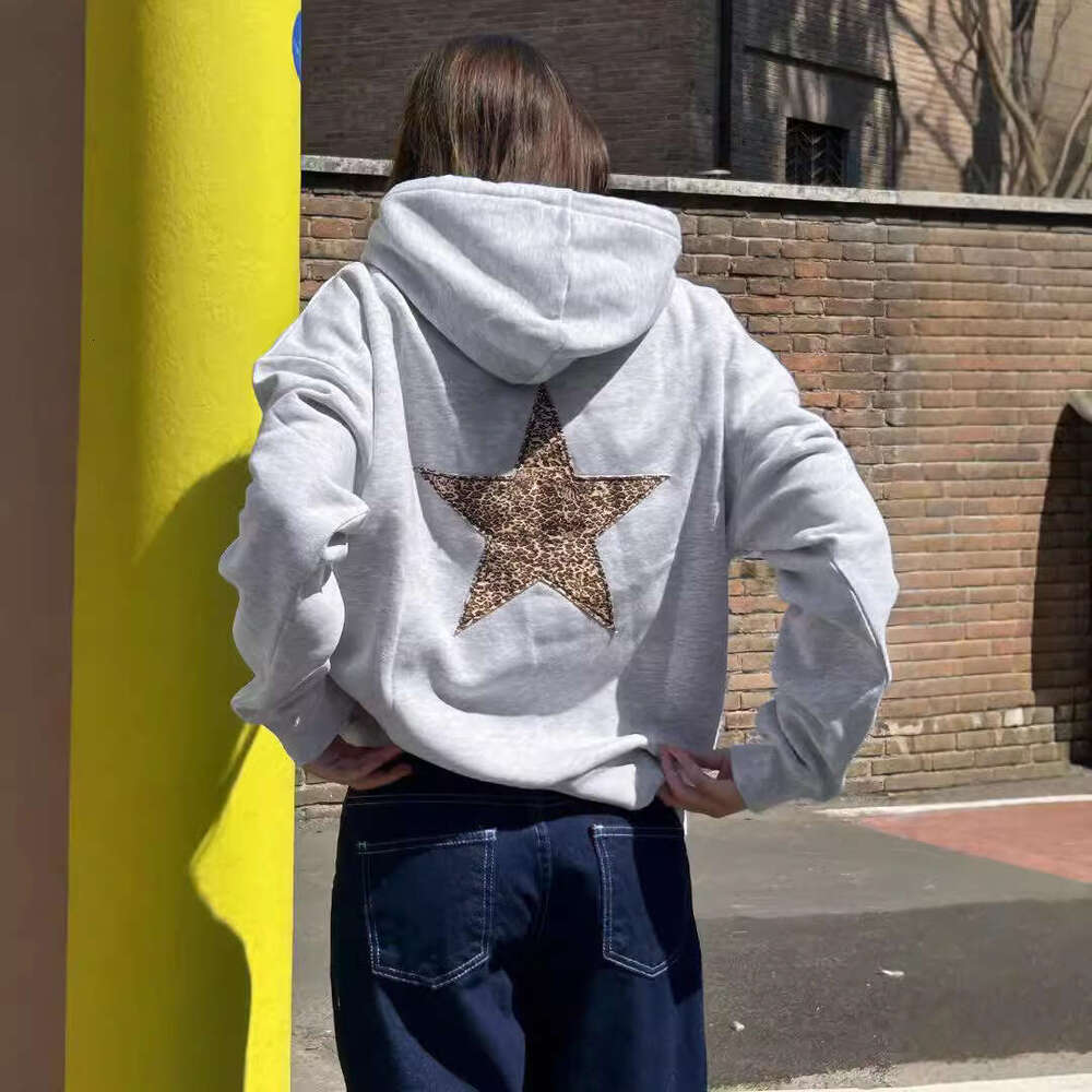 New women's long sleeved star printed shoulder down hooded with drawstring sweatshirt