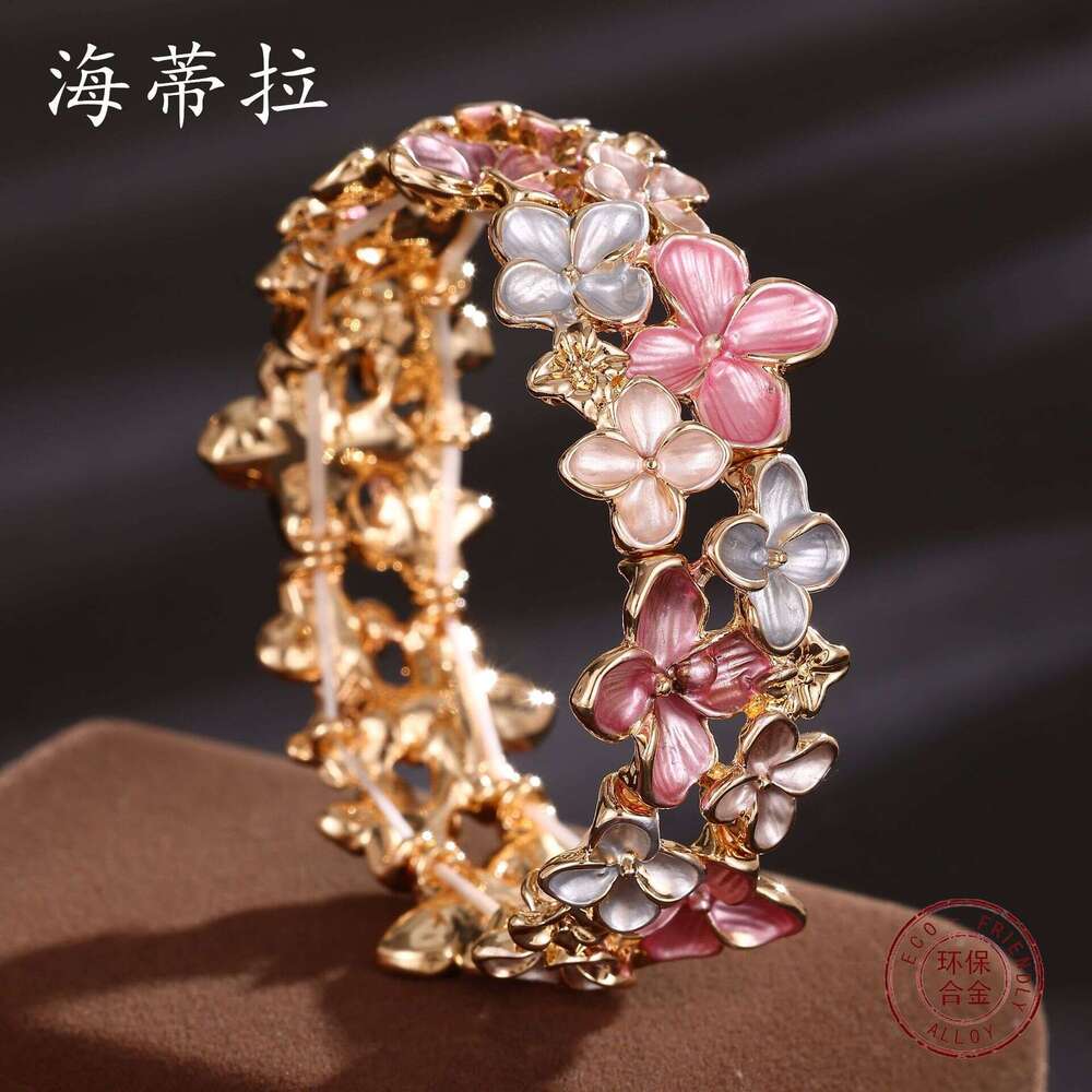 Designer bracelet Hot selg enamel colored elastic for women, high-end and versatile cherry blossom alloy bracelet