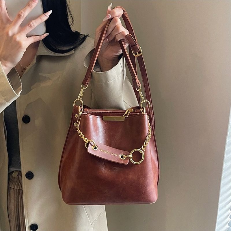 Bag, women's multifunctional soft leather multi compartment crossbody lazy style bag, diagonal cross bucket bag
