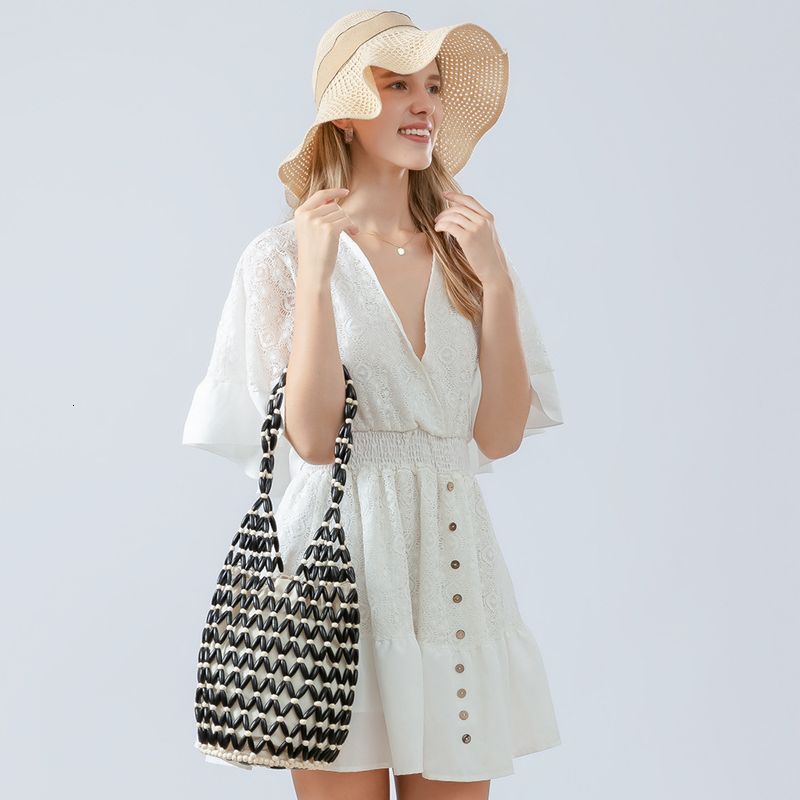 Woven for women with summer European and American niche design, hollowed out wooden bead bag, portable bucket shoulder bag