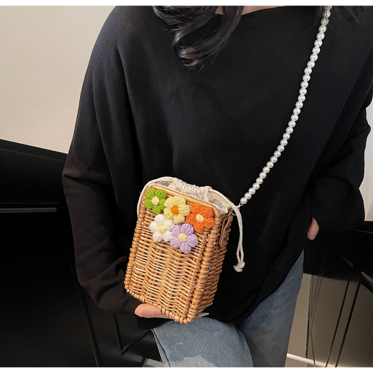 Woven grass woven for women's spring and summer 2025 new item, niche pearl crossbody bag, vacation hand-held beach bag #swissmilitary
