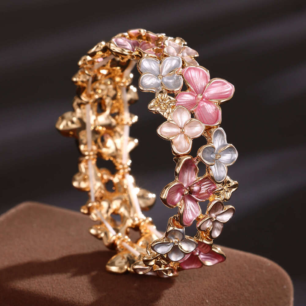 Designer bracelet Hot selg enamel colored elastic for women, high-end and versatile cherry blossom alloy bracelet