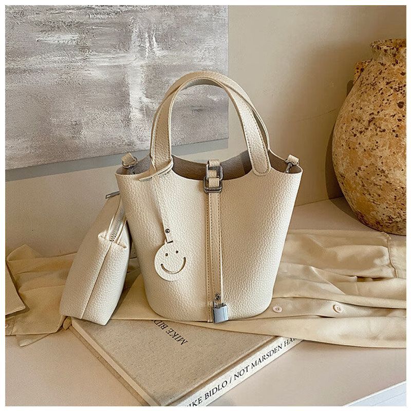 High end women's retro niche design small bucket bag with lychee pattern light handbag for women