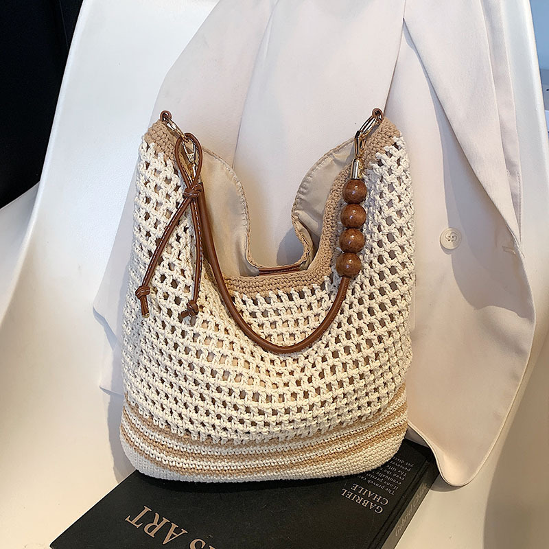 Beach vacation straw for women's 2025 summer new commuting shoulder crossbody bag, hollowed out woven tote bag #swissmilitary