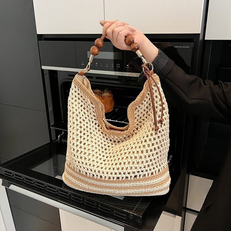 Spring and summer hollow women's 2025 new commuting single shoulder diagonal cross beach vacation grass woven tote bag #swissmilitary