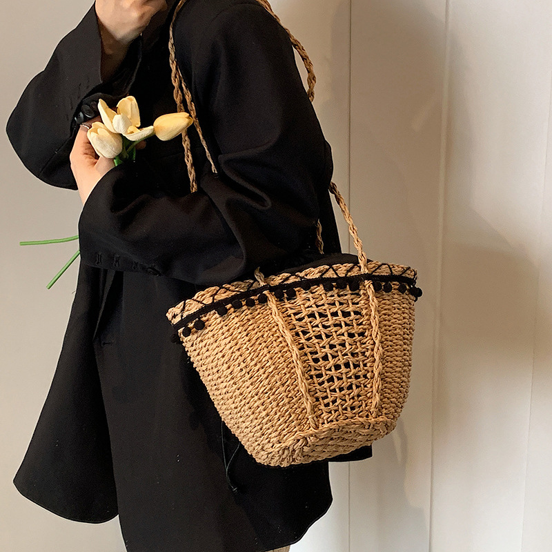 Korean hollow woven for women 2025 new cylindrical bag, beach resort French style hand-held single shoulder bucket bag #swissmilitary
