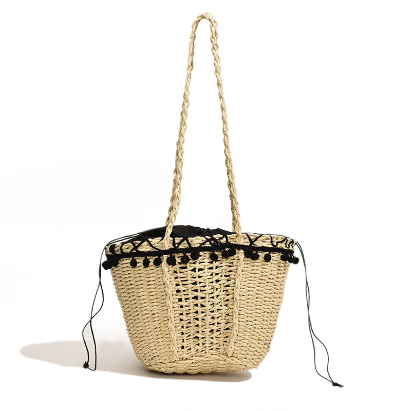 Korean hollow woven for women 2025 new cylindrical bag, beach resort French style hand-held single shoulder bucket bag #swissmilitary