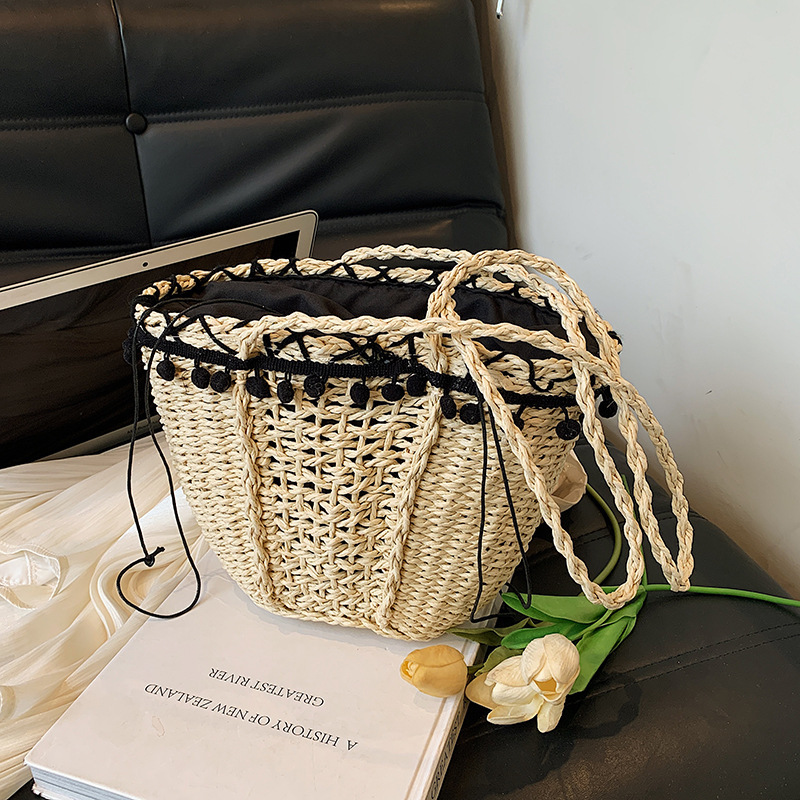 Korean hollow woven for women 2025 new cylindrical bag, beach resort French style hand-held single shoulder bucket bag #swissmilitary