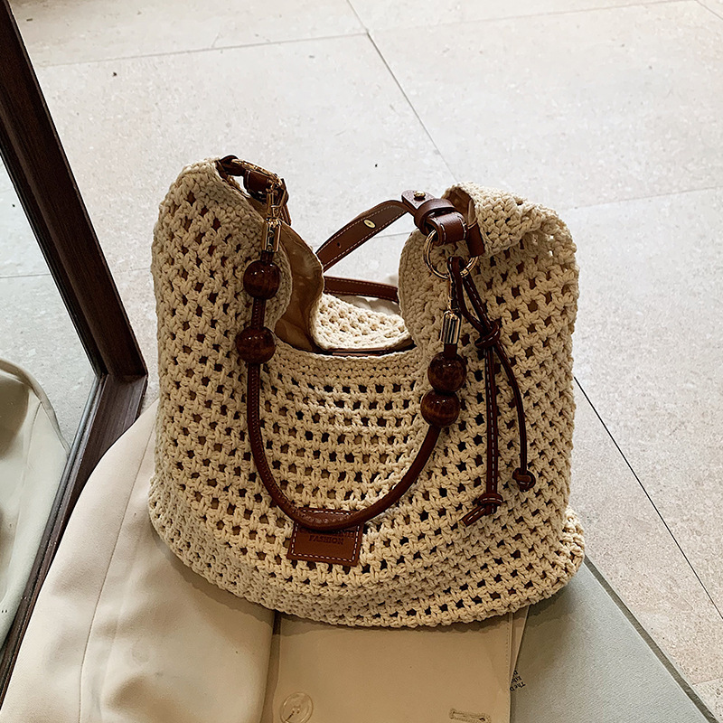 Beach vacation straw for women's 2025 summer new commuting shoulder crossbody bag, hollowed out woven tote bag #swissmilitary