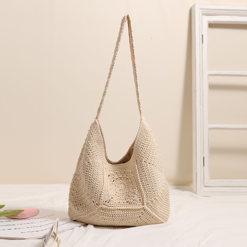 2025 High end single shoulder large capacity cotton thread with hollowed out flower grass woven vacation style beach bag, versatile women's bag #