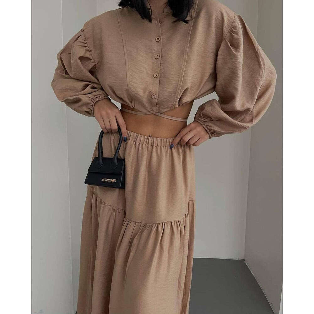 2024 European and American new lace up long sleeved top pleated split skirt set