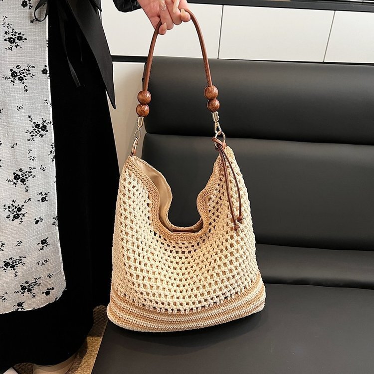 Spring and summer hollow women's 2025 new commuting single shoulder diagonal cross beach vacation grass woven tote bag #swissmilitary