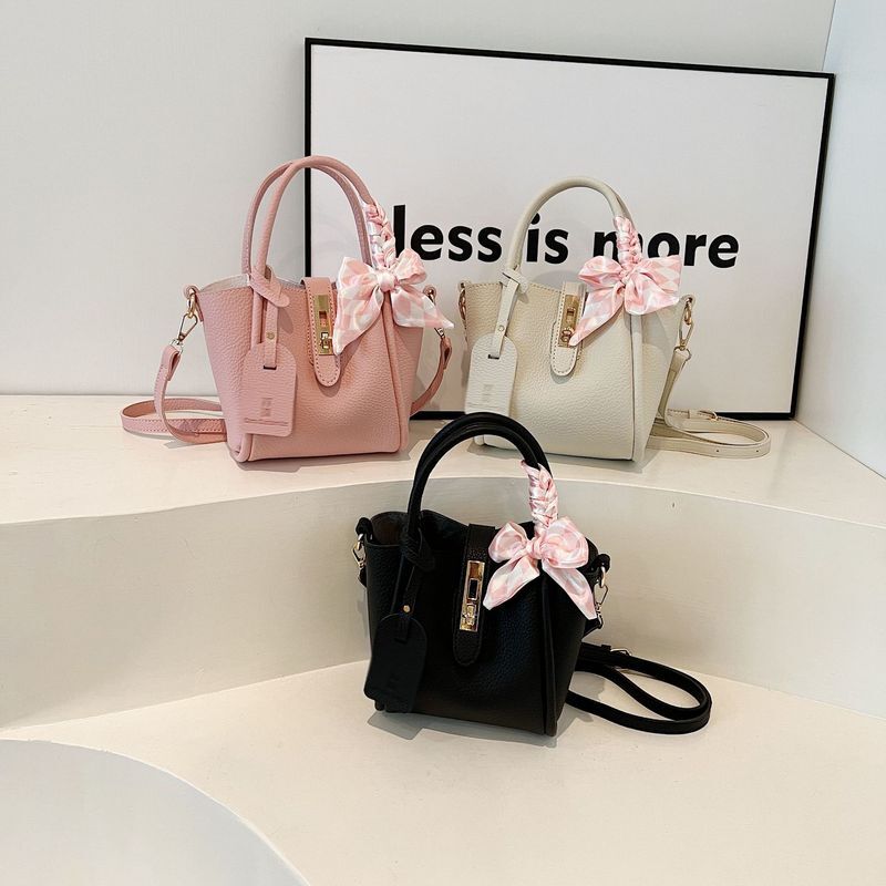 French lock solid color handbag for women 2024 new butterfly bow bucket elegant single shoulder crossbody bag