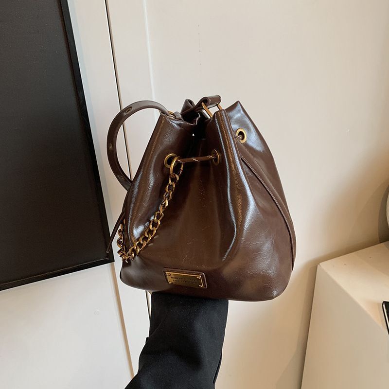 Retro Niche Bucket Women's New High-end Fashion Versatile Small Single Shoulder Crossbody Bag
