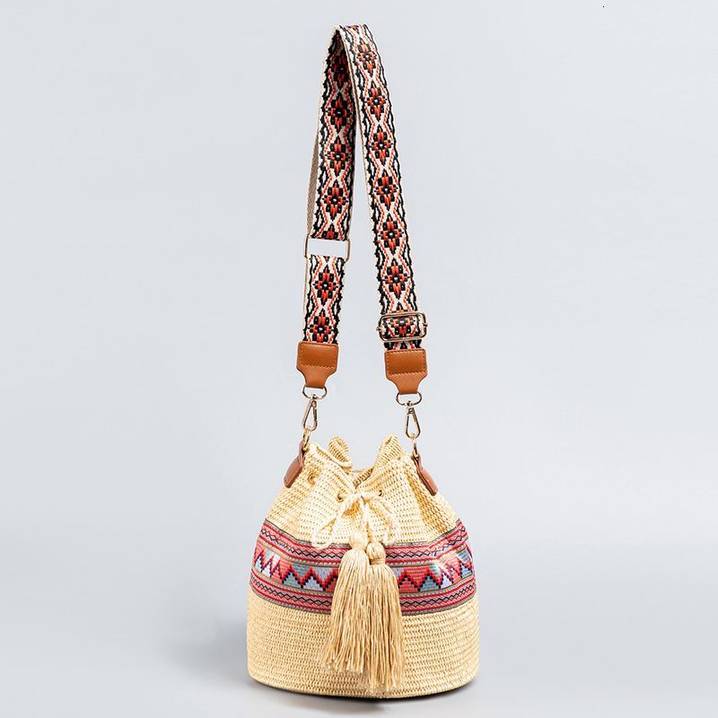 Holiday straw cross-border beach bucket women's high-end exquisite shoulder seaside diagonal span woven bag