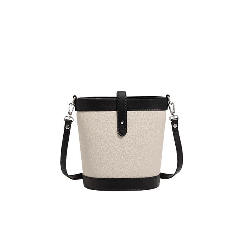 Genuine color blocked small bucket 2024 new niche women's fashionable cloth patterned leather crossbody ba, shoulder
