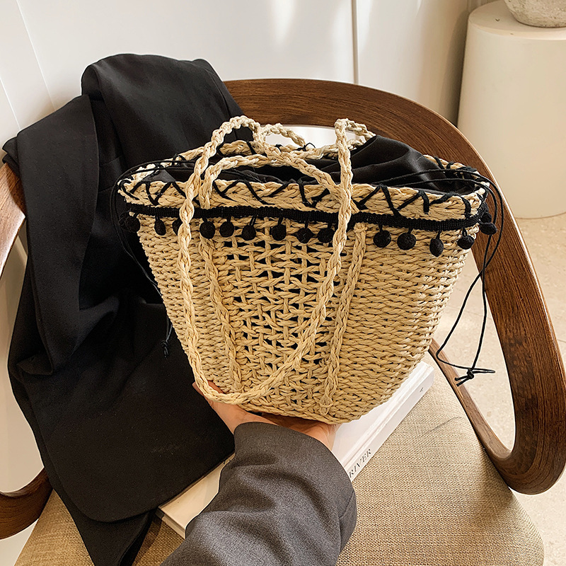 Korean hollow woven for women 2025 new cylindrical bag, beach resort French style hand-held single shoulder bucket bag #swissmilitary