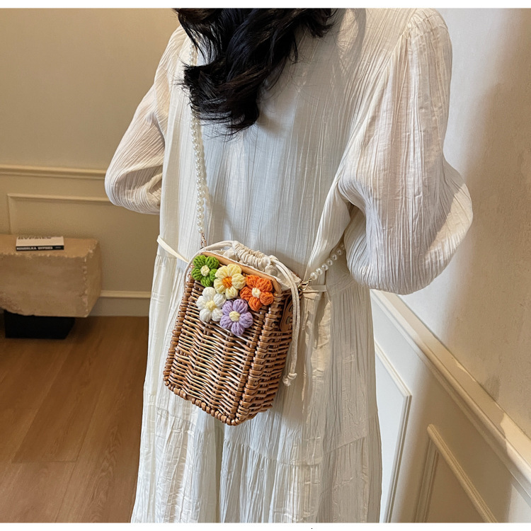Woven grass woven for women's spring and summer 2025 new item, niche pearl crossbody bag, vacation hand-held beach bag #swissmilitary