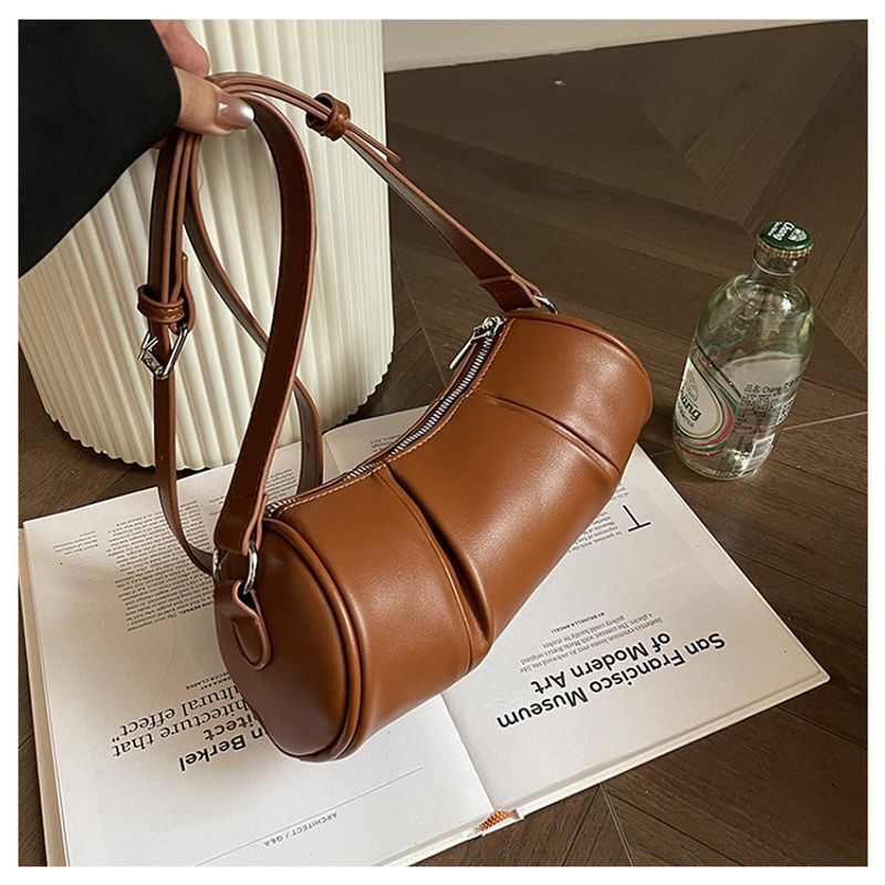 Korean version simple cydrical women's 2024 new niche pillow versatile casual shoulder crossbody bag