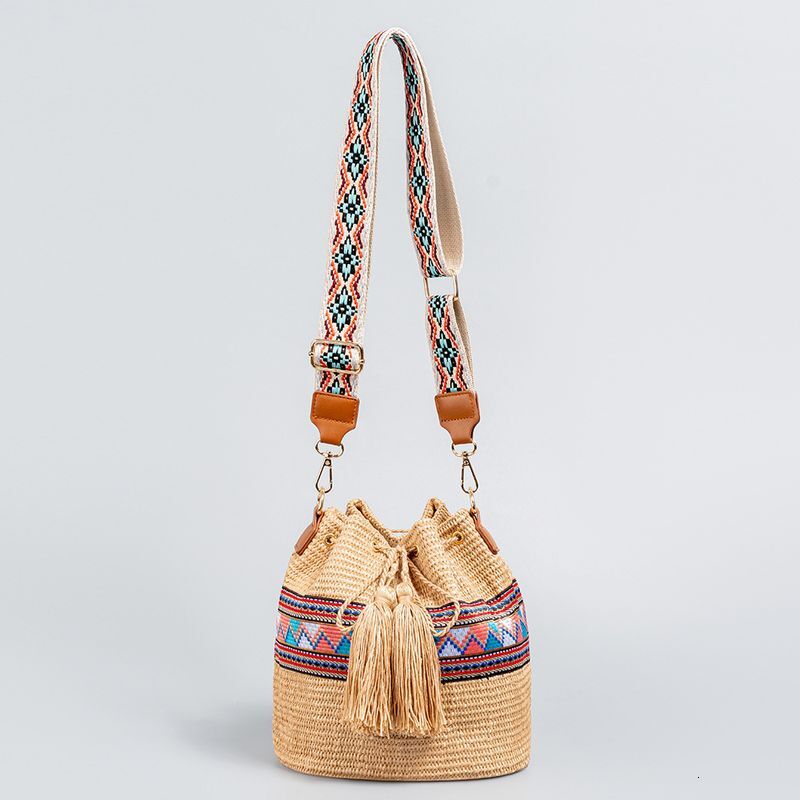 Holiday straw cross-border beach bucket women's high-end exquisite shoulder seaside diagonal span woven bag