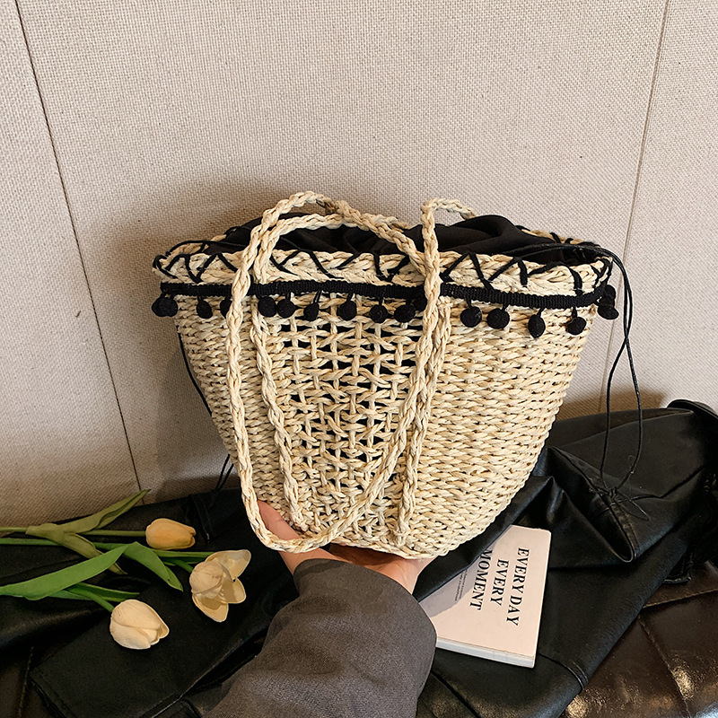 Korean hollow woven for women 2025 new cylindrical bag, beach resort French style hand-held single shoulder bucket bag #swissmilitary