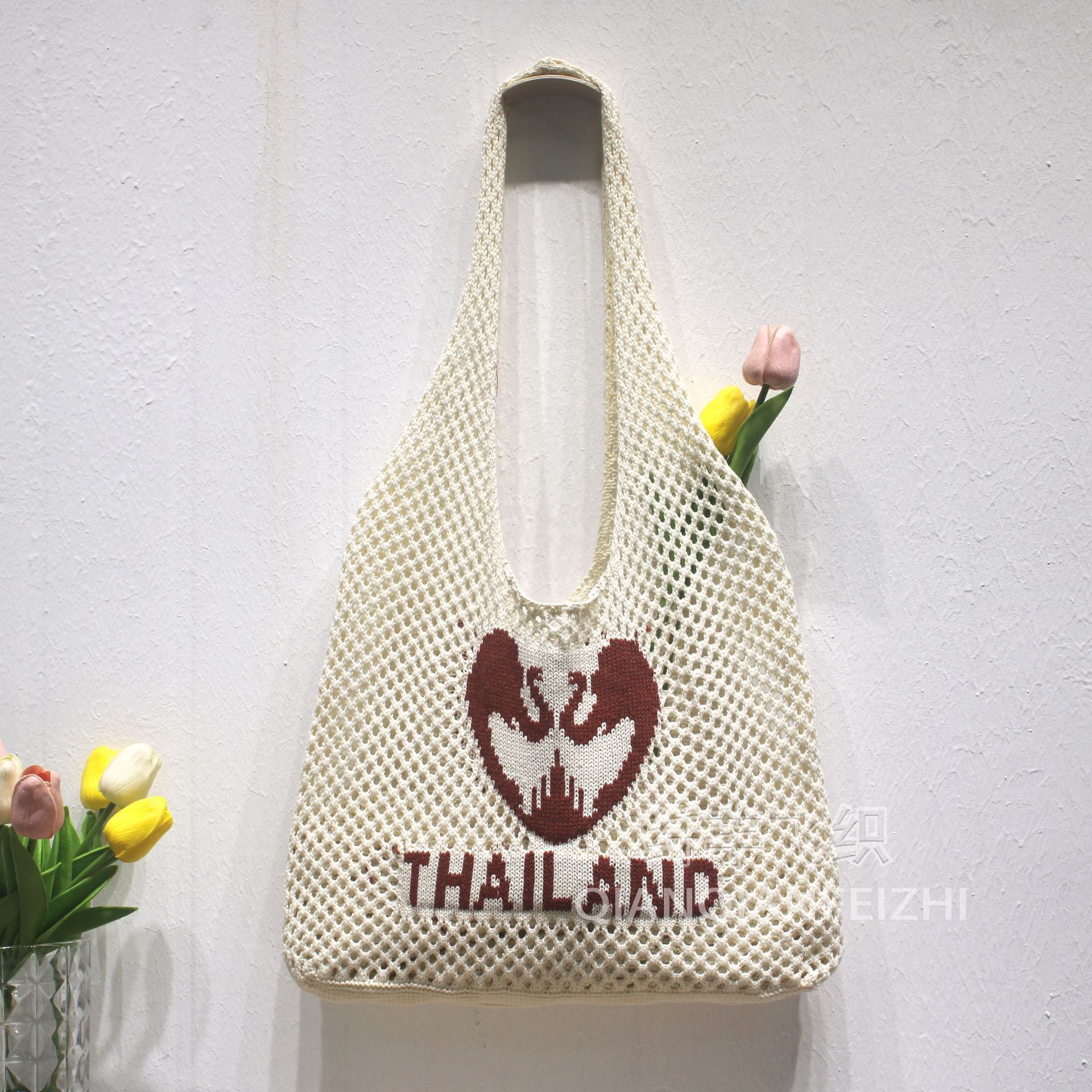 Spring and summer lazy style beach vacation tote 2025 knitted hollowed out shoulder woven bag #swissmilitary