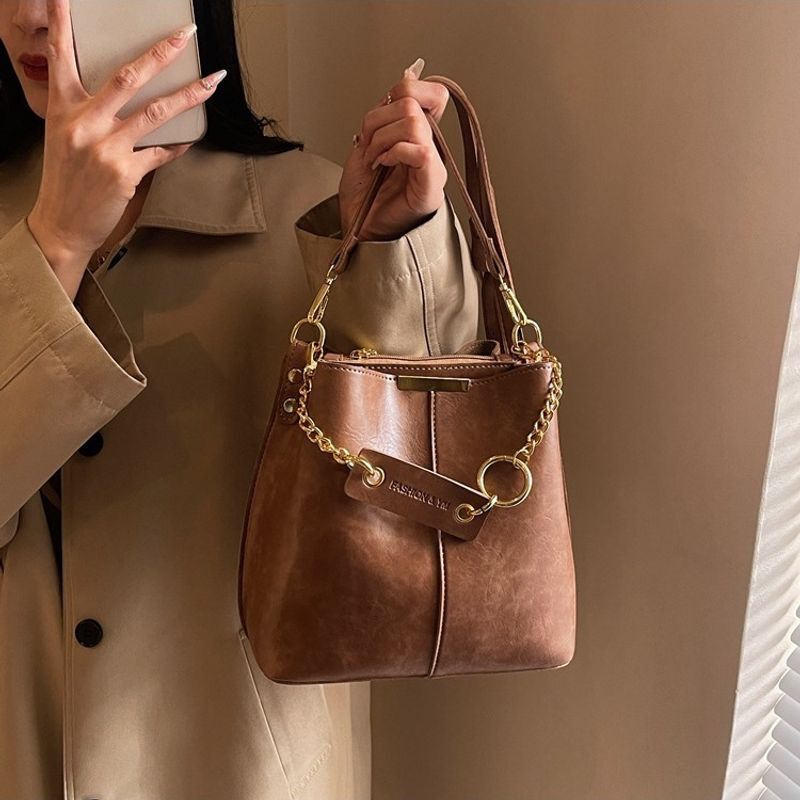 Bag, women's multifunctional soft leather multi compartment crossbody lazy style bag, diagonal cross bucket bag