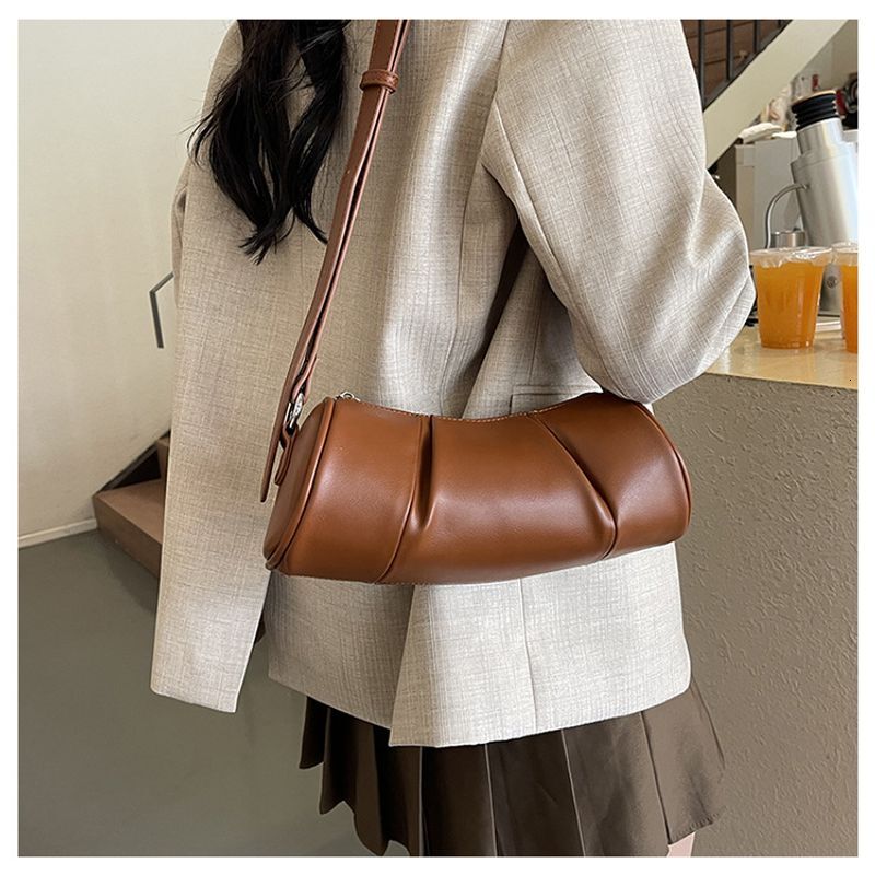 Korean version simple cydrical women's 2024 new niche pillow versatile casual shoulder crossbody bag