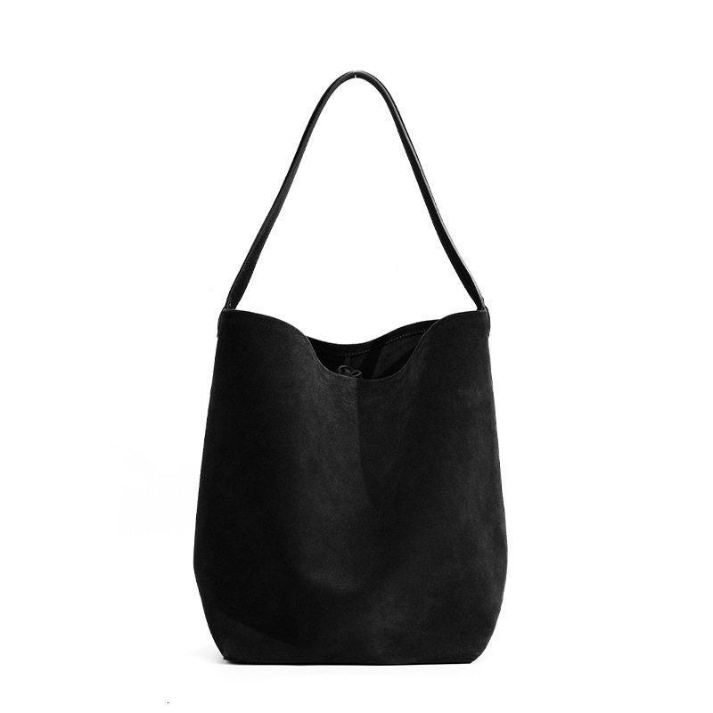 Guangzhou women's niche versatile portable shoulder bags, solid color commuting large-capacity high-end matte leather bucket bags