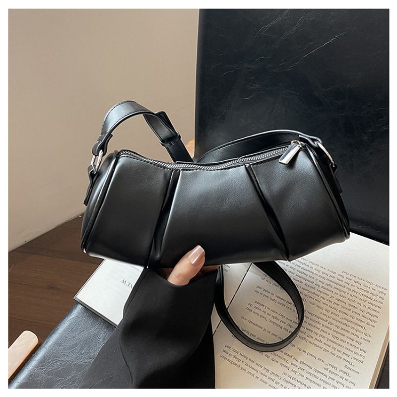 Korean version simple cydrical women's 2024 new niche pillow versatile casual shoulder crossbody bag
