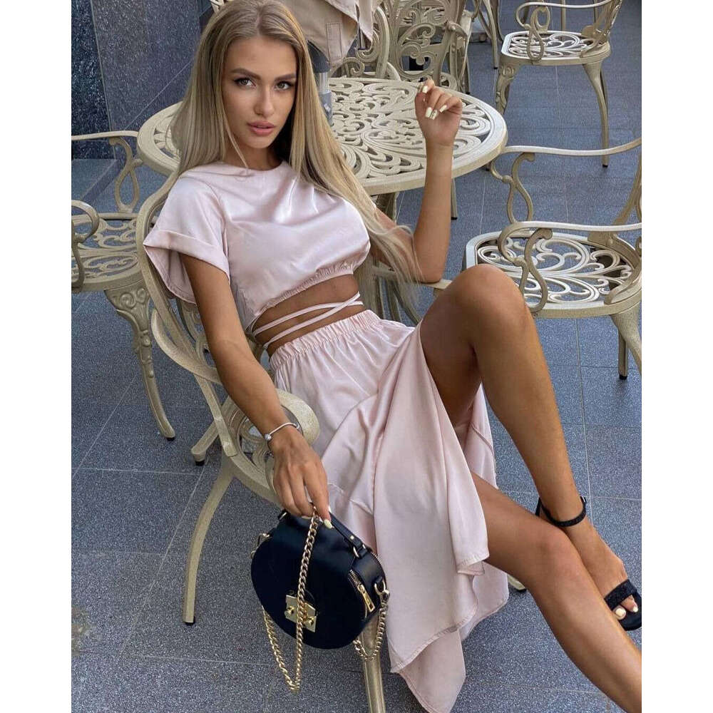 2024 European and American new short sleeved top split skirt solid color commuting two-piece set