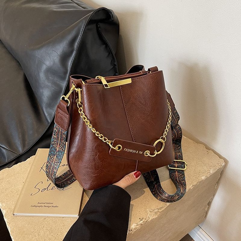 Bag, women's multifunctional soft leather multi compartment crossbody lazy style bag, diagonal cross bucket bag