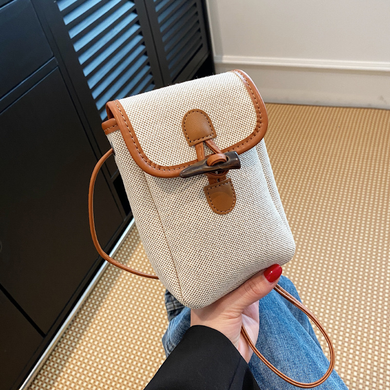 Color collision beach vacation grass for women 2025 new summer crossbody popular hand woven mobile phone bag #swissmilitary