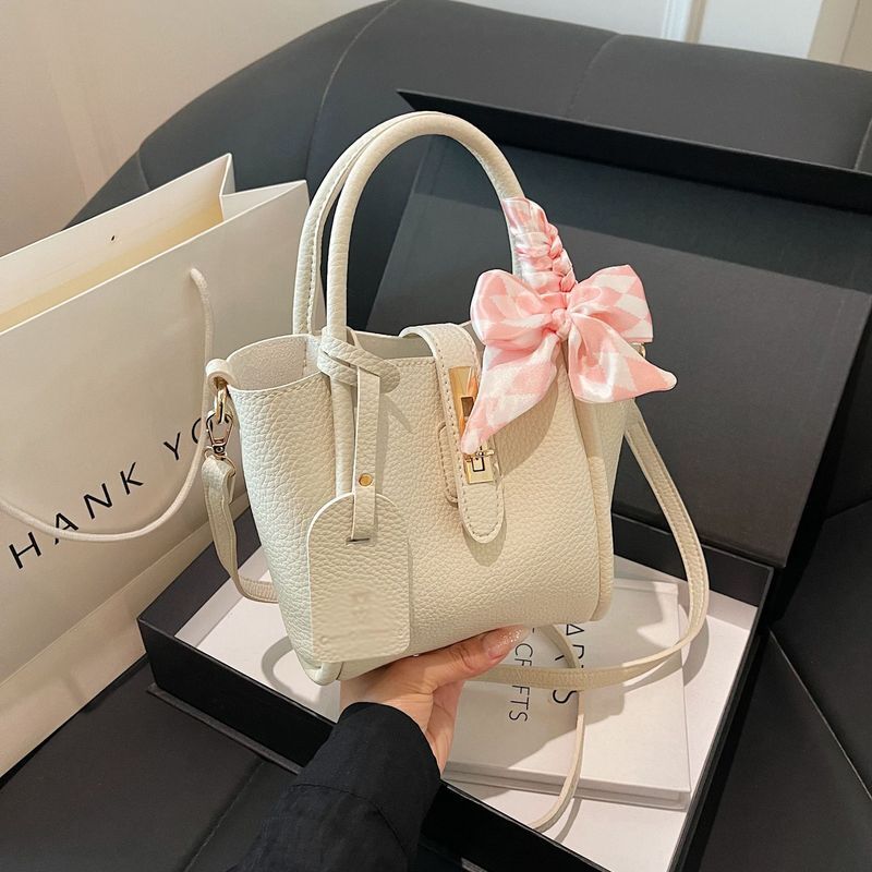 French lock solid color handbag for women 2024 new butterfly bow bucket elegant single shoulder crossbody bag
