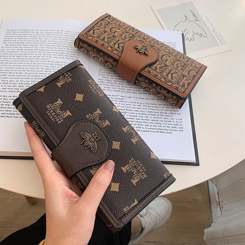 New 2025 Women's Buckle Printed Bee Fashion Simple Three fold Large Capacity Handheld Wallet Designer with Multiple Card Spaces Trendy Zero Walle