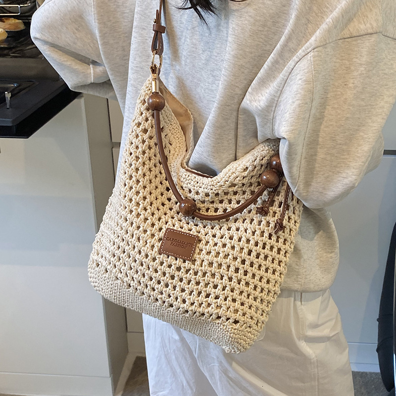 Beach vacation straw for women's 2025 summer new commuting shoulder crossbody bag, hollowed out woven tote bag #swissmilitary
