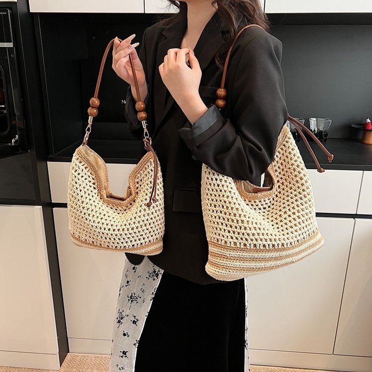 Spring and summer hollow women's 2025 new commuting single shoulder diagonal cross beach vacation grass woven tote bag #swissmilitary