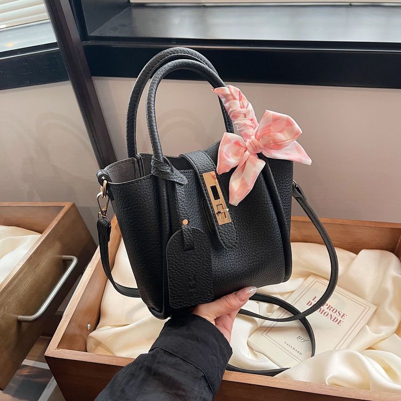 French lock solid color handbag for women 2024 new butterfly bow bucket elegant single shoulder crossbody bag