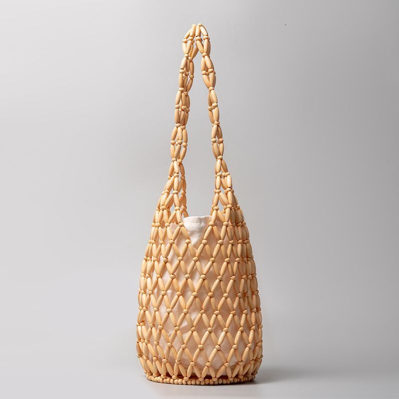 Woven for women with summer European and American niche design, hollowed out wooden bead bag, portable bucket shoulder bag