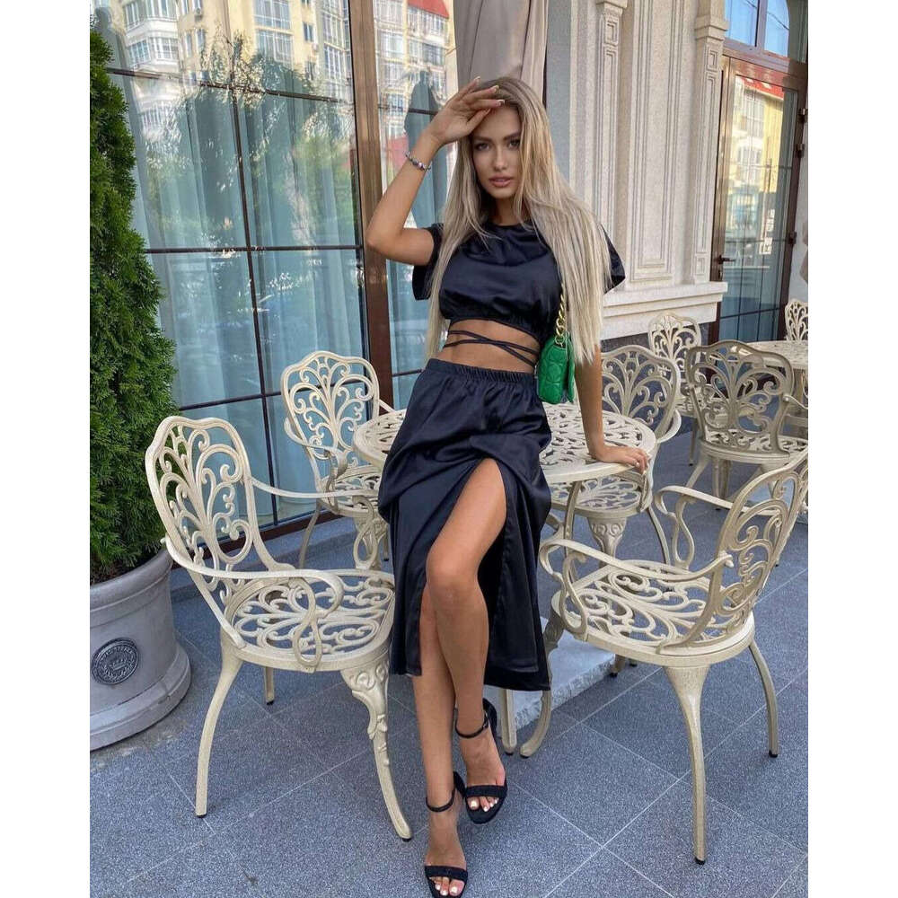 2024 European and American new short sleeved top split skirt solid color commuting two-piece set