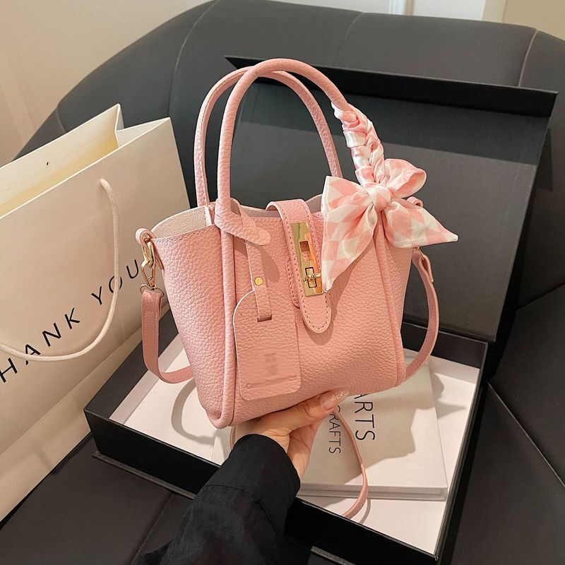 French lock solid color handbag for women 2024 new butterfly bow bucket elegant single shoulder crossbody bag