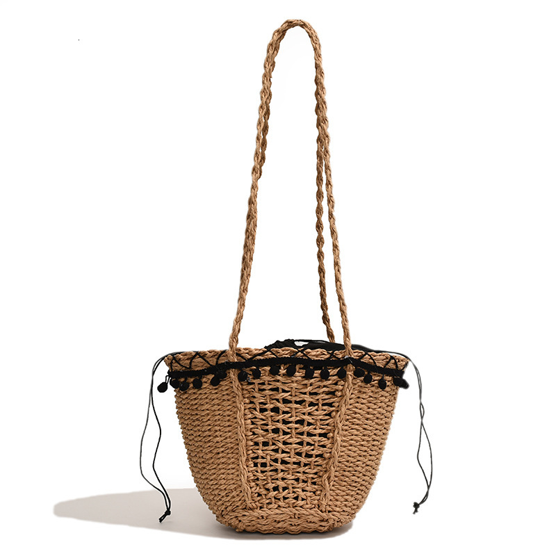 Korean hollow woven for women 2025 new cylindrical bag, beach resort French style hand-held single shoulder bucket bag #swissmilitary