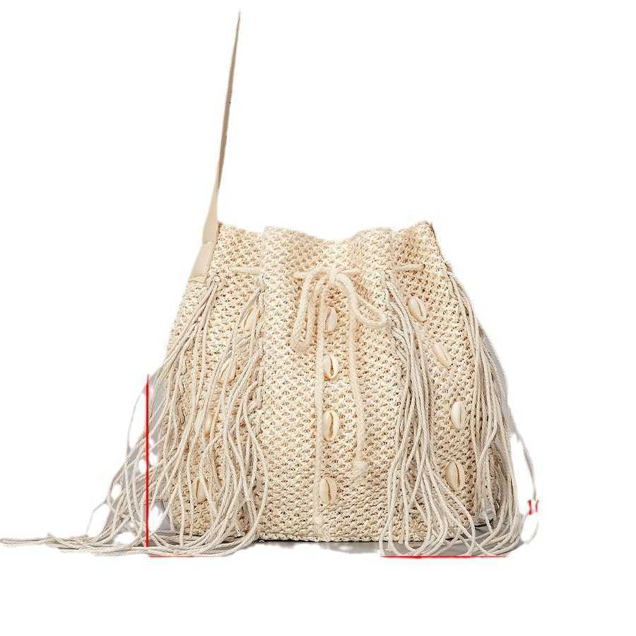 Handwoven tassel grass woven bag for women summer beach drawstring handbag with large capacity shell single shoulder diagonal cross bag 250215